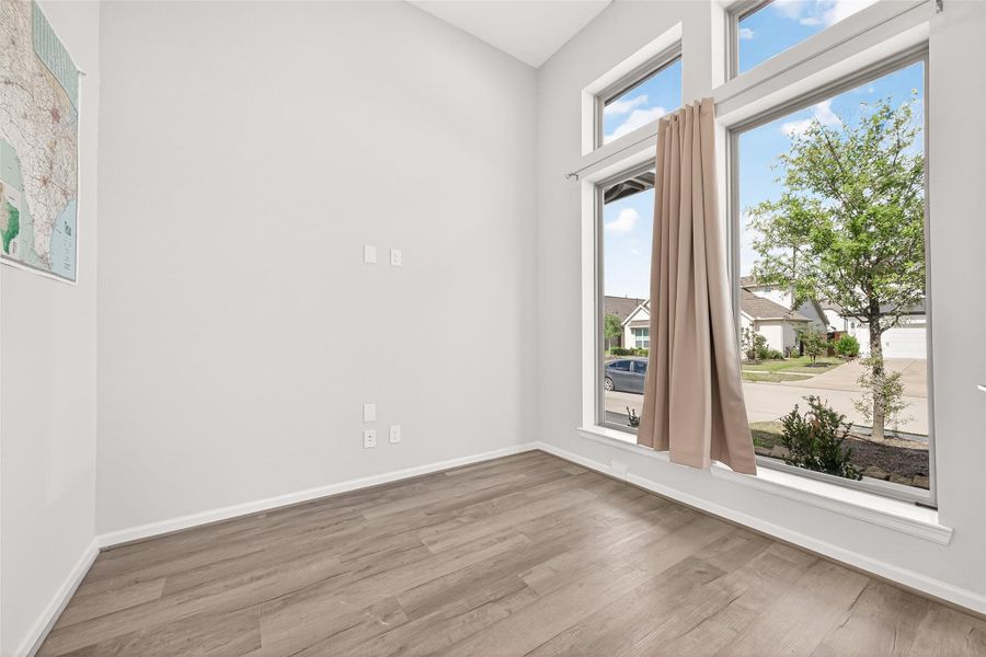 Spacious, unfurnished interior of a new home in Cane Island, Katy (Image 20).