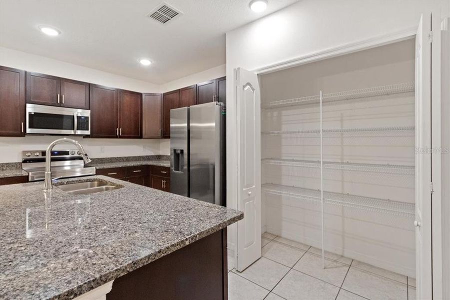 Furnished interior view inside a new home in Poinciana, Poinciana (Image 13). Furnished interior view inside a new home in Poinciana, Poinciana (Image 13).
