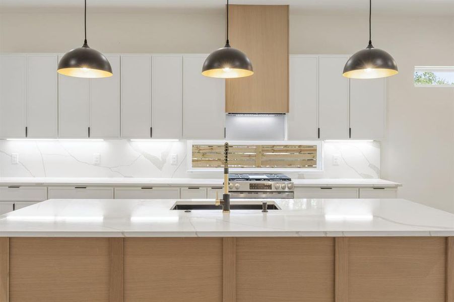 Straight out of the pages of Architectural Digest, this impeccably designed kitchen is a stunning showcase of sophistication, functionality, and timeless style. Every thoughtfully curated detail—from the warm wood accents and crisp white cabinetry to the designer lighting and elegant finishes—comes together to create a space that is as beautiful as it is practical. Straight out of the pages of Architectural Digest, this impeccably designed kitchen is a stunning showcase of sophistication, functionality, and timeless style. Every thoughtfully curated detail—from the warm wood accents and crisp white cabinetry to the designer lighting and elegant finishes—comes together to create a space that is as beautiful as it is practical.
