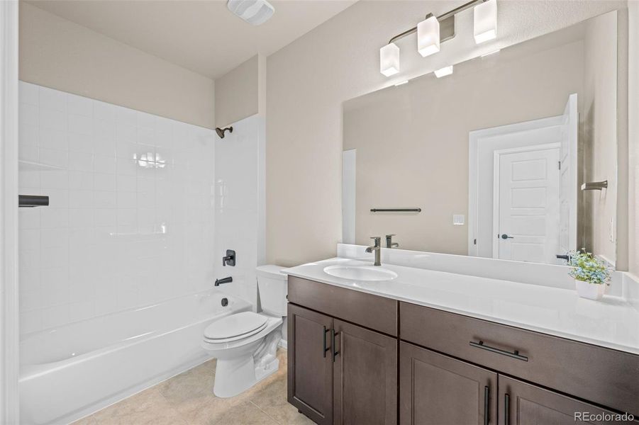 Furnished interior view inside a new home in Painted Prairie, Aurora (Image 9).