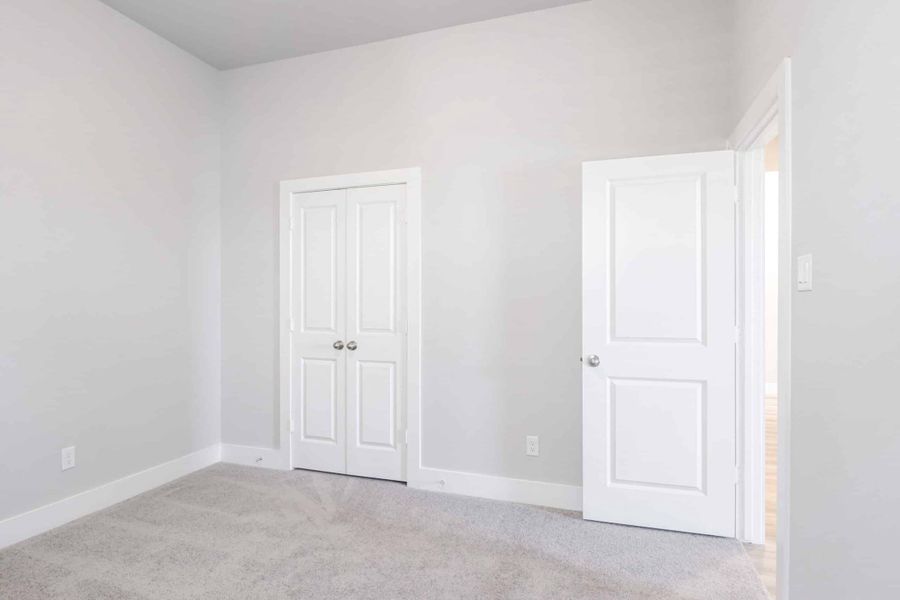 Representative unfurnished interior of a home built from the The Teton by Lillian Custom Homes in Polo Ridge, Heath (Image 19).