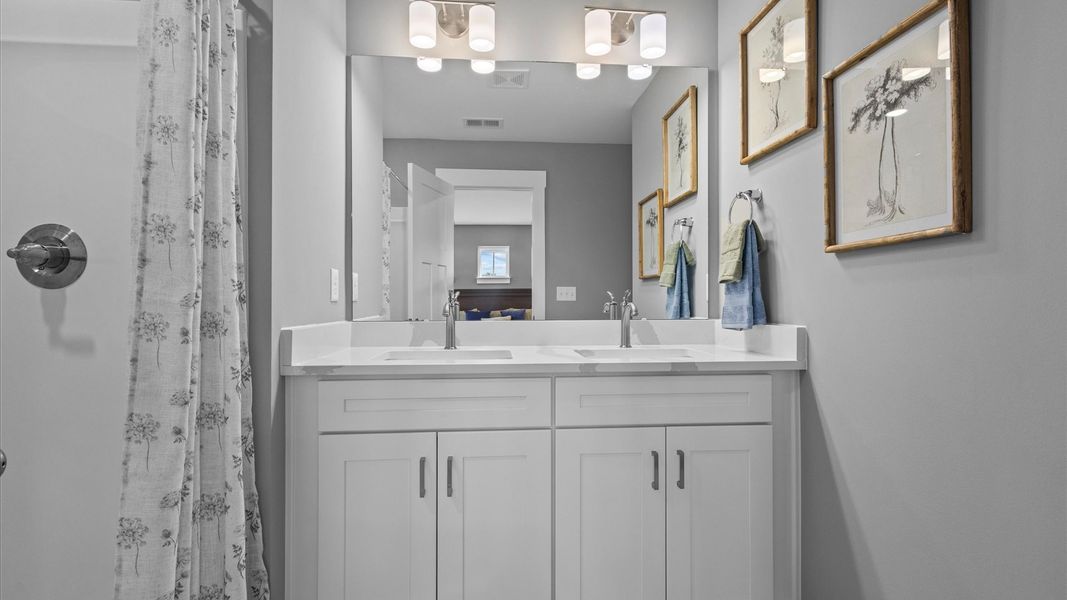 Representative furnished interior of a home built from the Mint by DRB Homes in Harrier Point, Woodruff (Image 31).