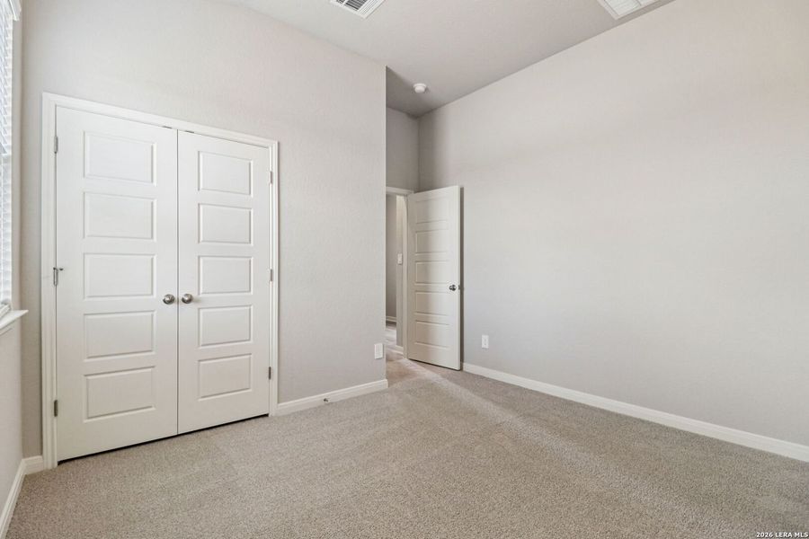 Spacious, unfurnished interior of a new home in Estancia Ranch - Classic Series, San Antonio (Image 22).