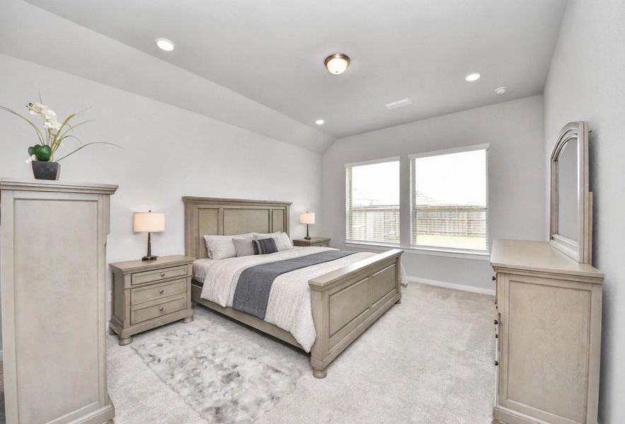 Primary Bedroom entrance view with plenty of natural light.