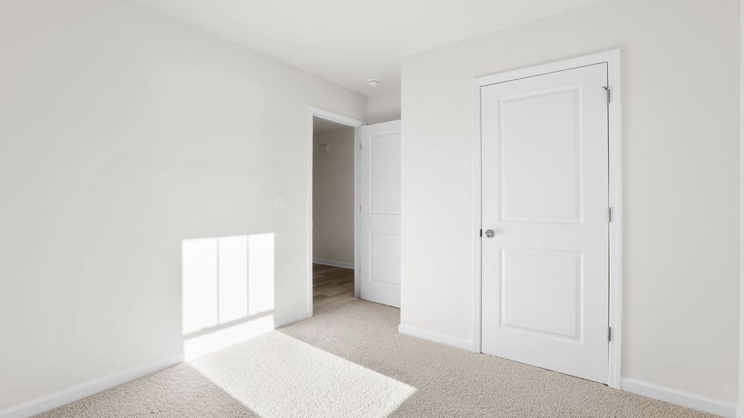 Spacious, unfurnished interior of a new home in Village Grove, Greenville (Image 15).