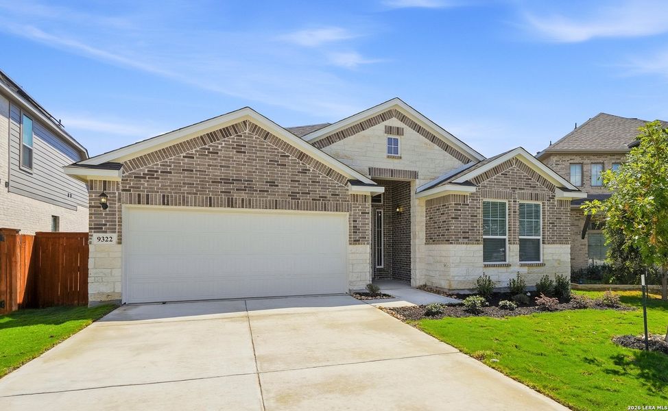 Front exterior of a new home in Stillwater Ranch, San Antonio, TX, highlighting curb appeal (Image 21).