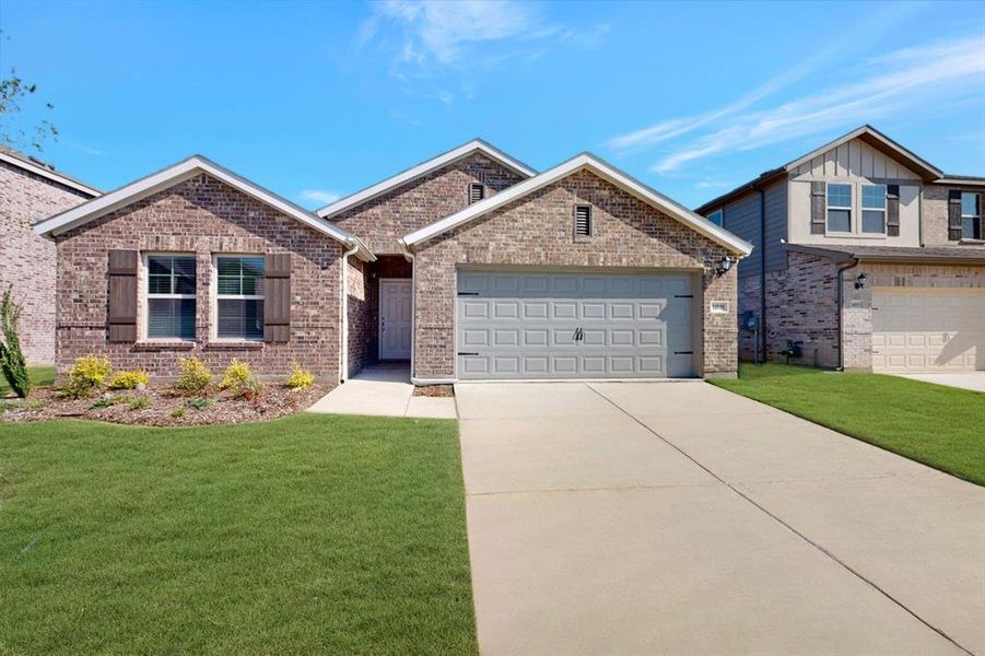 Front exterior of a new home in Mobberly Farms, Pilot Point, TX, highlighting curb appeal (Image 17).