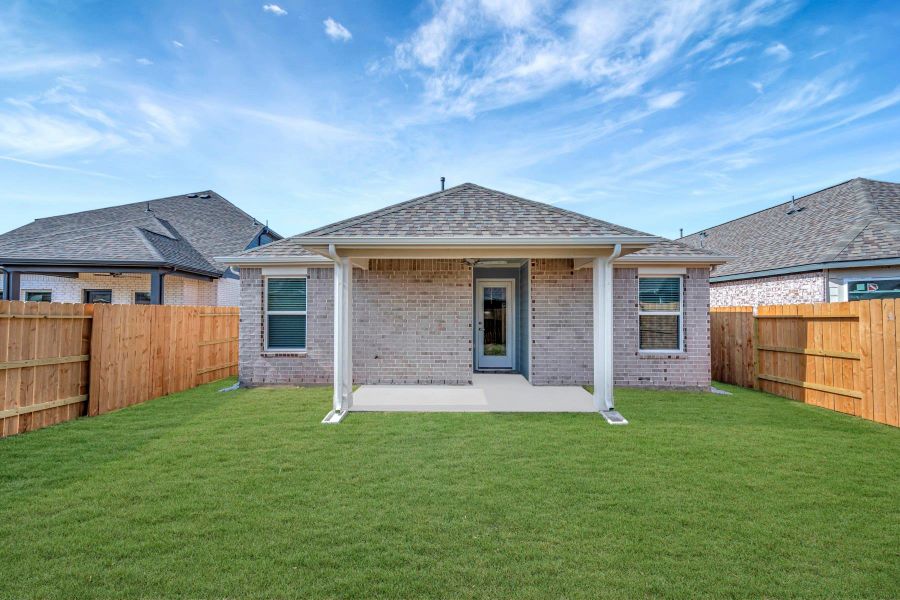 Exterior details and patio area of a home in Marvida, Cypress (Image 19).
