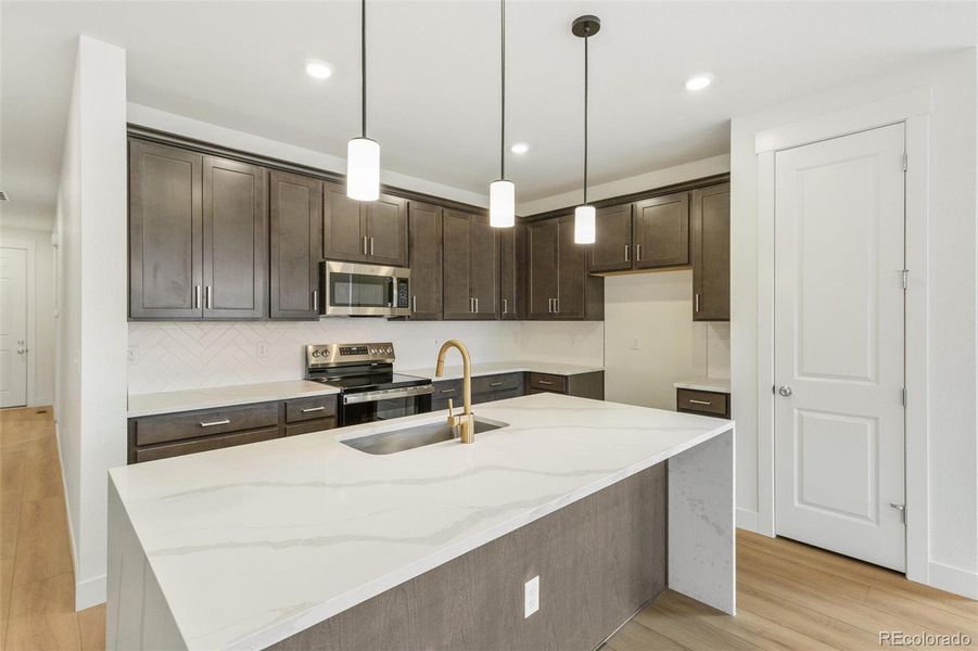 Furnished interior view inside a new home in Painted Prairie, Aurora (Image 7).