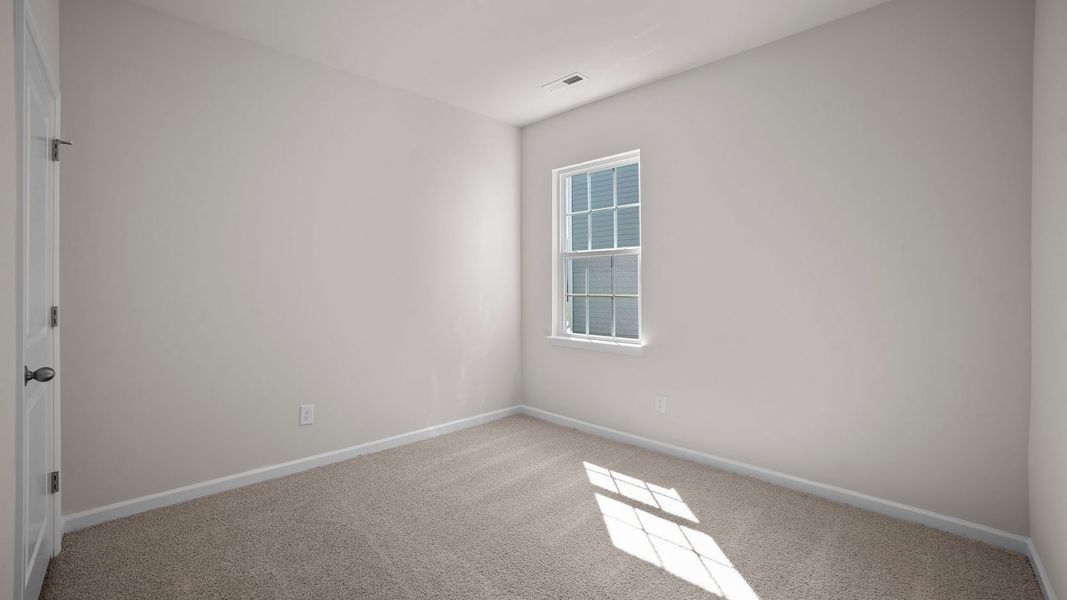 Spacious, unfurnished interior of a new home in Ridgewood Farms, Winterville (Image 18).