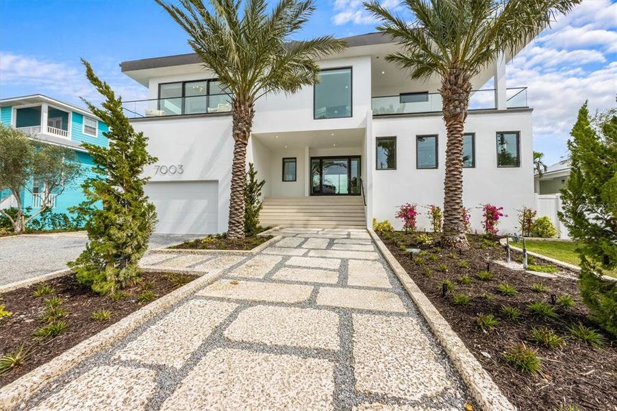 Front exterior of a new home in , Holmes Beach, FL, highlighting curb appeal (Image 19).
