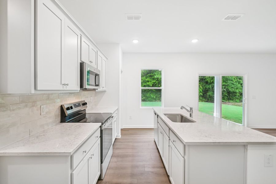 Representative furnished interior of a home built from the Brooke by Ashton Woods in Middleton Farms, Middlesex (Image 7).