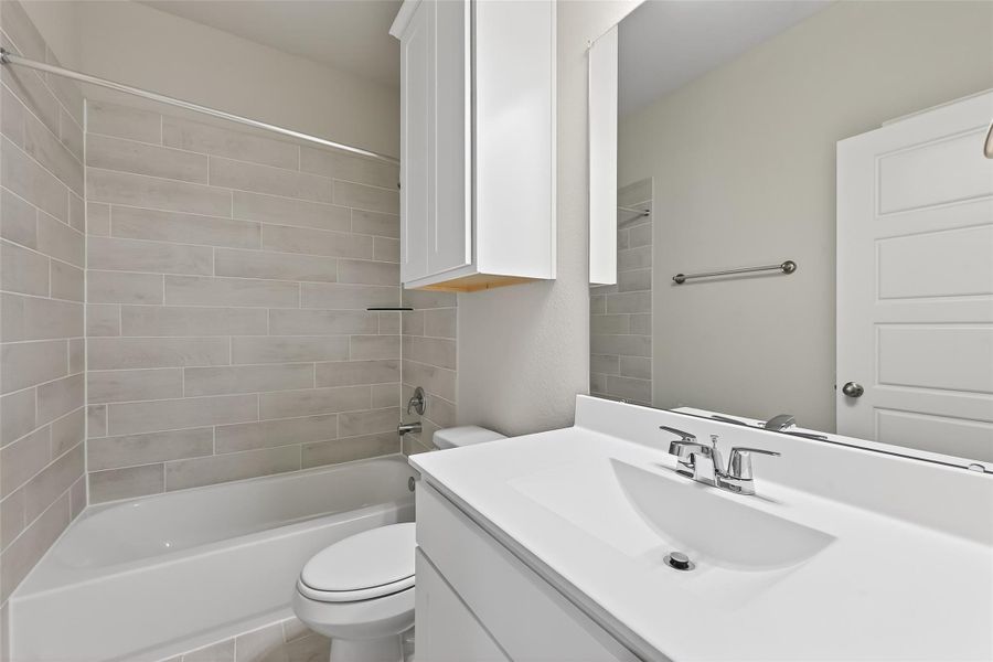 Furnished interior view inside a new home in Grand Magnolia, Magnolia (Image 12).