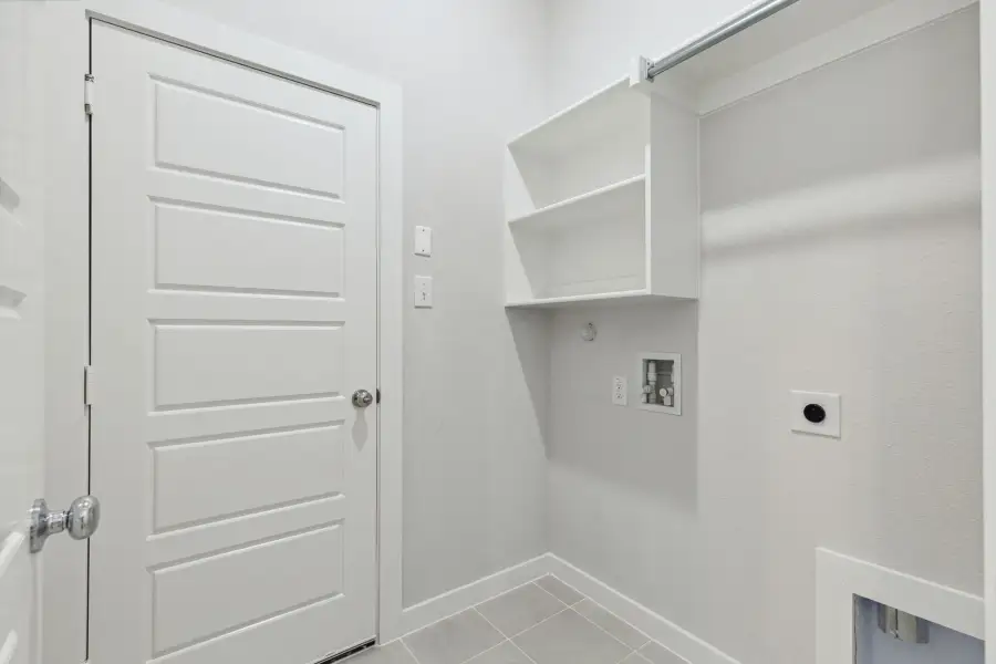 Utility Room in the Ash home plan by Trophy Signature Homes – REPRESENTATIVE PHOTO Utility Room in the Ash home plan by Trophy Signature Homes – REPRESENTATIVE PHOTO