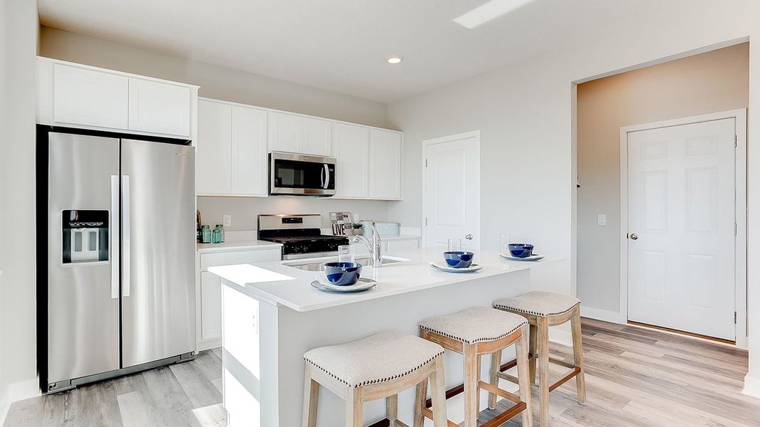 Representative furnished interior of a home built from the The Sienna by D.R. Horton in Thornton Townes, Raleigh (Image 9).