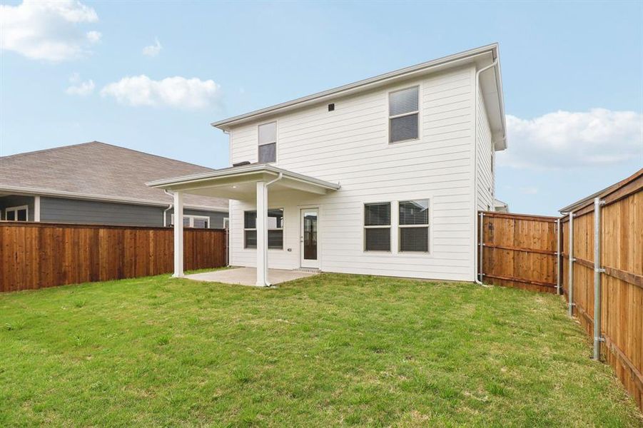 Exterior details and patio area of a home in Lakehaven - Spring Series, Farmersville (Image 4).