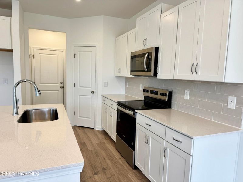 Furnished interior view inside a new home in Coastal Haven, Leland (Image 18).