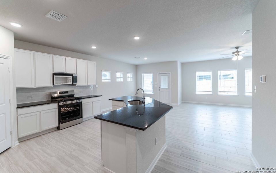 Furnished interior view inside a new home in Hickory Ridge, Elmendorf (Image 5).