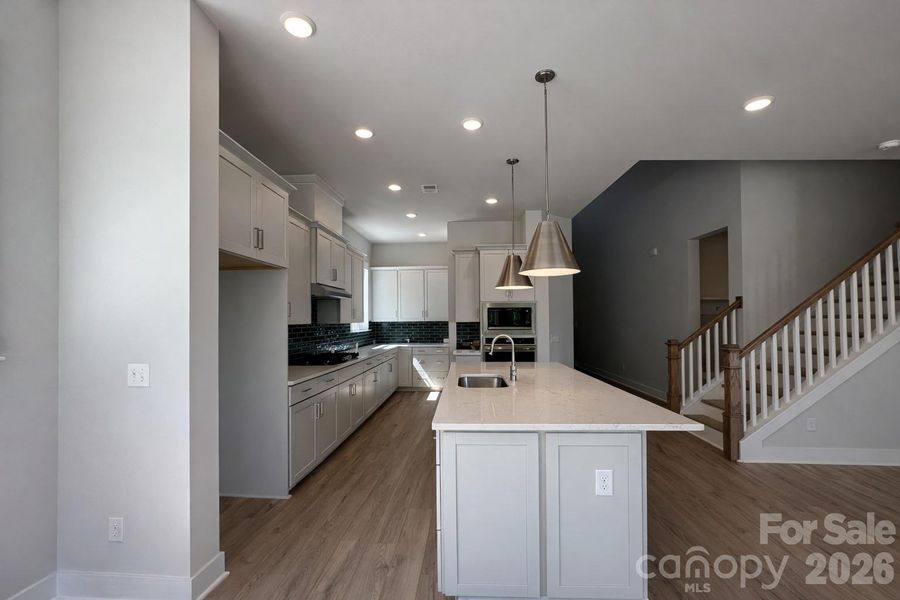 Features a Grand 2-Story Foyer into the Impressive Gourmet Kitchen