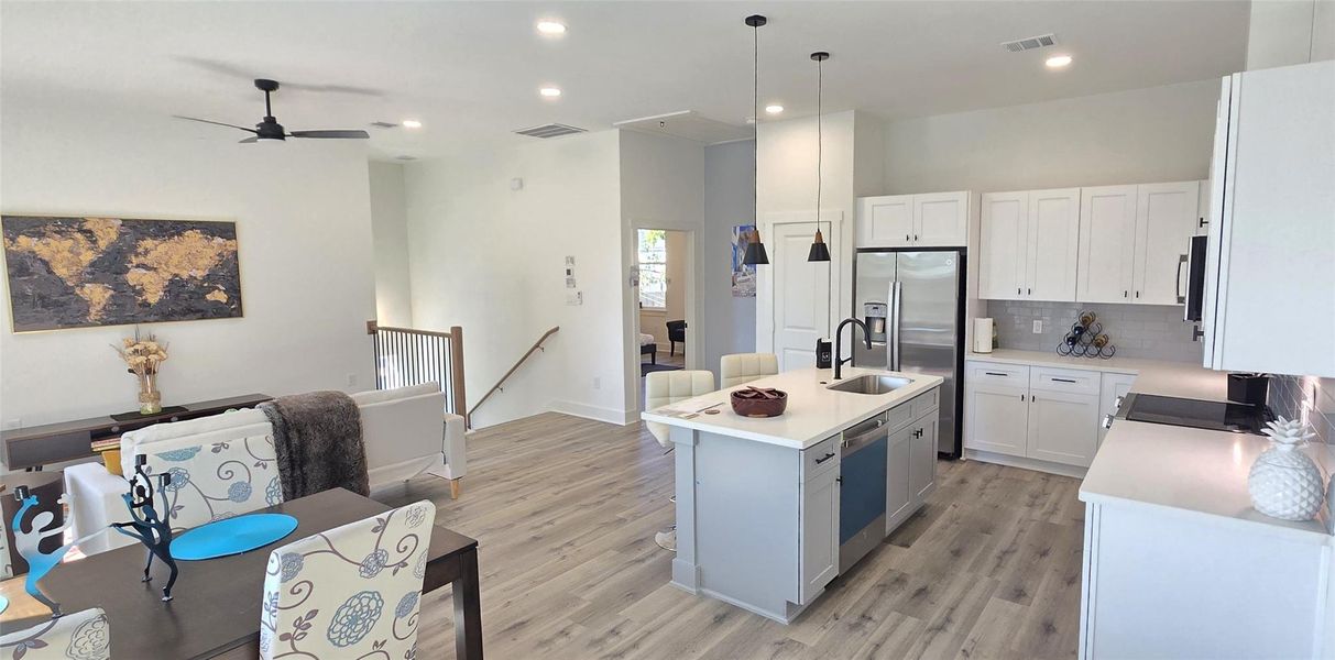 Flexible living space with room for full size dining table and large living room sofa