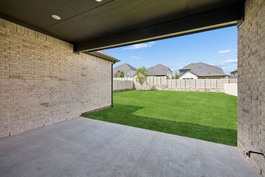 Exterior details and patio area of a home in Painted Tree Lakeside, McKinney (Image 3).