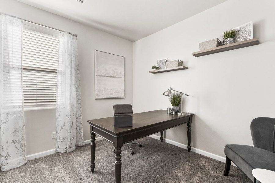 Representative furnished interior of a home built from the Valencia by Hakes Brothers in Hillside Park, El Paso (Image 38).