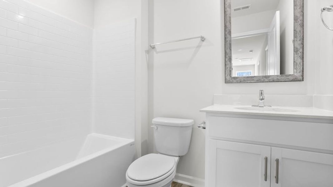 Furnished interior view inside a new home in Village Grove, Greenville (Image 11).