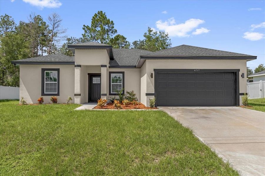 Front exterior of a new home in , Ocala, FL, highlighting curb appeal (Image 17).