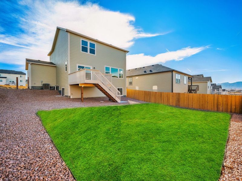 Exterior details and patio area of a home in Ridge at Lorson Ranch, Colorado Springs (Image 23).