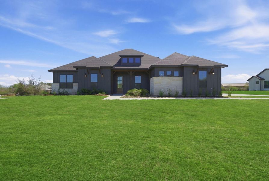 Front exterior of a new home in Chapel Bend, Montgomery, TX, highlighting curb appeal (Image 20).