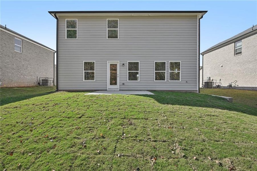 Exterior details and patio area of a home in Creekside at Oxford Park, Fairburn (Image 3).