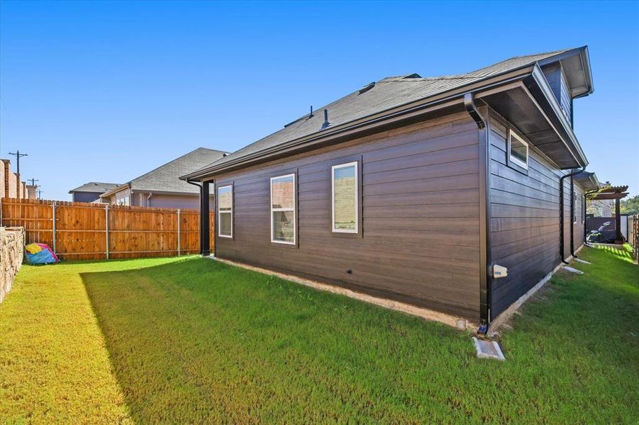 Front exterior of a new home in Aubrey Creek Estates, Aubrey, TX, highlighting curb appeal (Image 19). Front exterior of a new home in Aubrey Creek Estates, Aubrey, TX, highlighting curb appeal (Image 19).