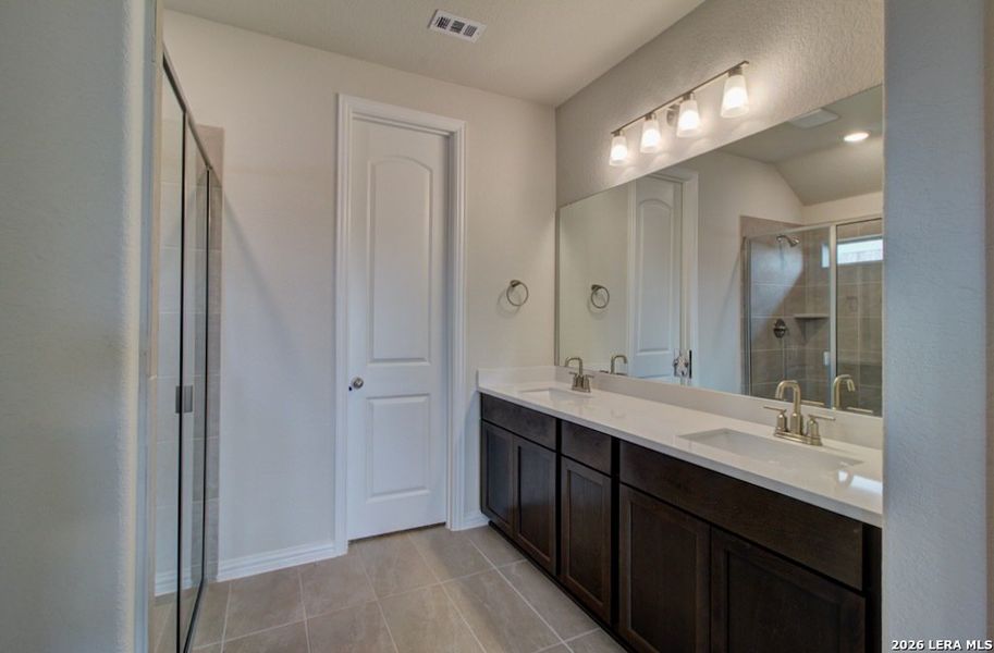 Furnished interior view inside a new home in Stream Waters, Seguin (Image 7).