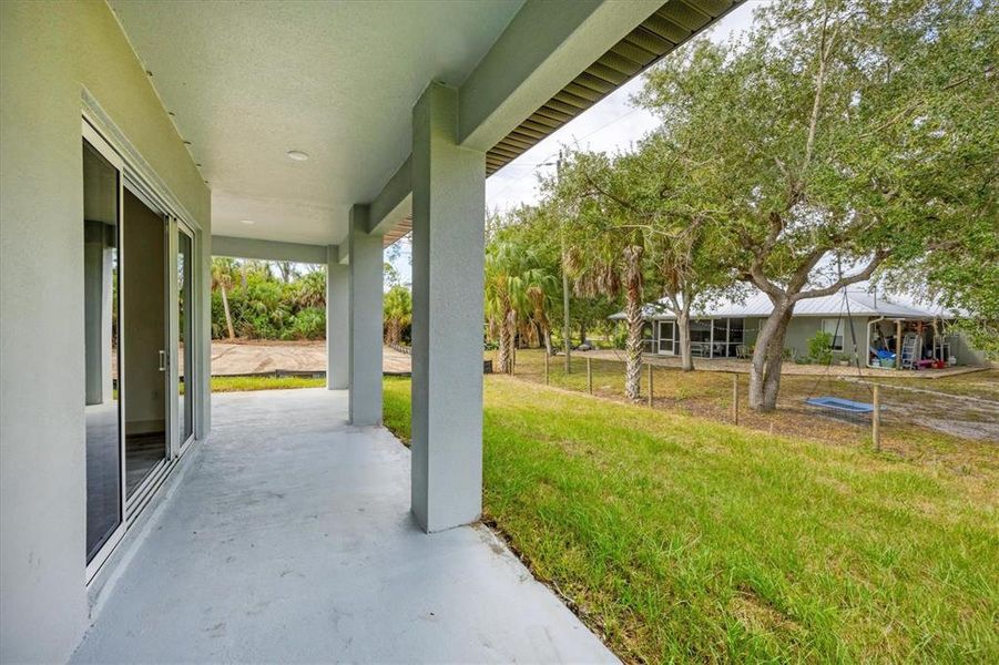 Exterior details and patio area of a home in , Port Charlotte (Image 21).