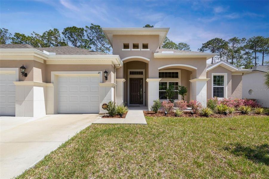 Front exterior of a new home in , Palm Coast, FL, highlighting curb appeal (Image 26).