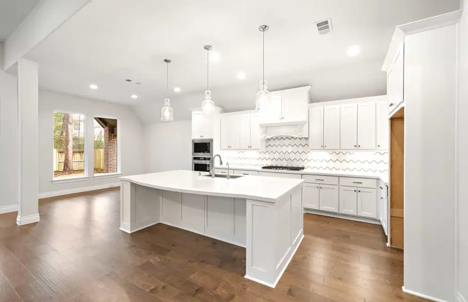 Representative furnished interior of a home built from the 3068 by Ravenna Homes in The Woodlands Hills 65′, Willis (Image 7).