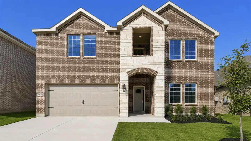 Front exterior of a new home in Silverado, Aubrey, TX, highlighting curb appeal (Image 1). Front exterior of a new home in Silverado, Aubrey, TX, highlighting curb appeal (Image 1).