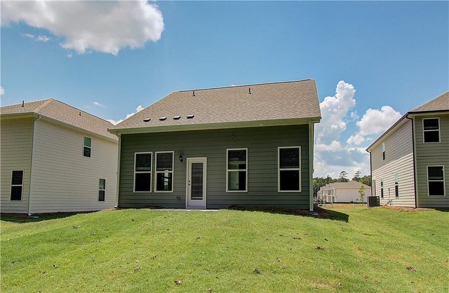 Front exterior of a new home in Enclave at Evergreen, Fairburn, GA, highlighting curb appeal (Image 14).
