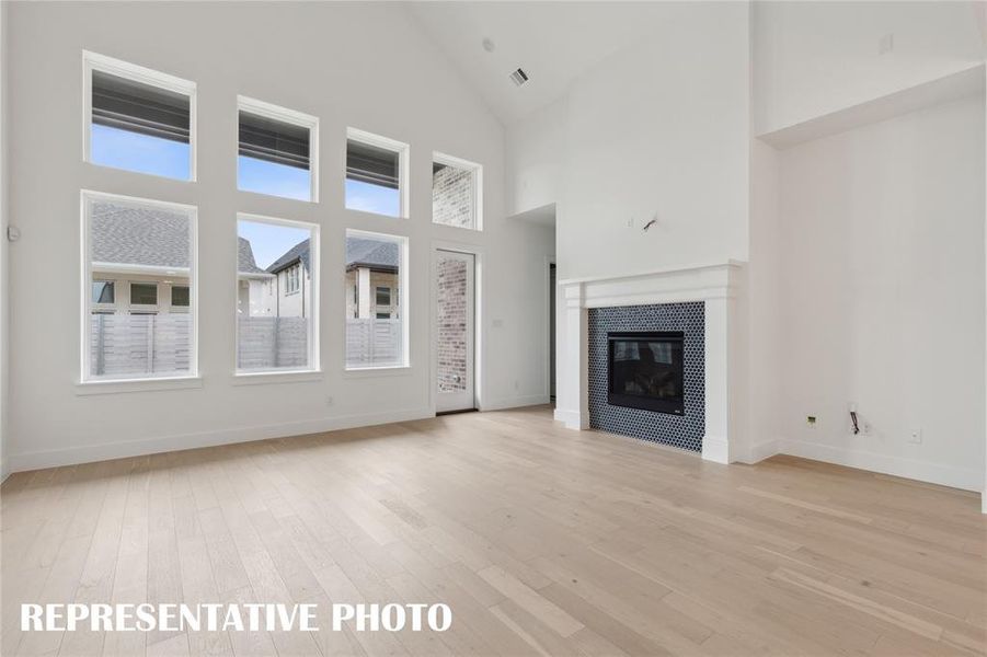 The entire family will love family get togethers in this lovely, light filled living room.  REPRESENTATIVE PHOTO