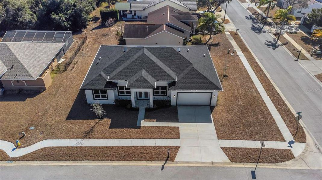 Front exterior of a new home in , Hudson, FL, highlighting curb appeal (Image 35).