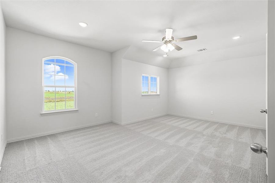 Unfurnished room with light colored carpet, recessed lighting, and ceiling fan Unfurnished room with light colored carpet, recessed lighting, and ceiling fan