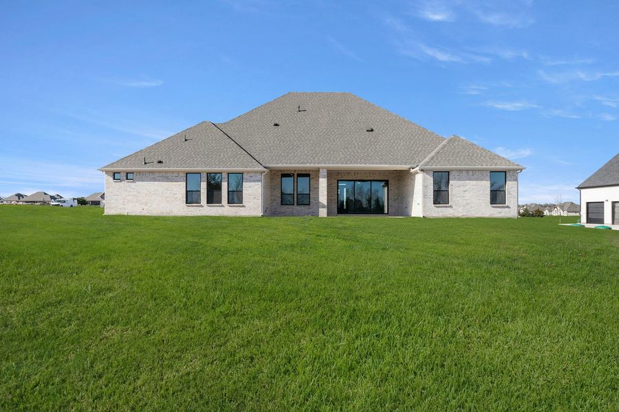 Exterior details and patio area of a home in Heritage, McLendon-Chisholm (Image 4). Exterior details and patio area of a home in Heritage, McLendon-Chisholm (Image 4).
