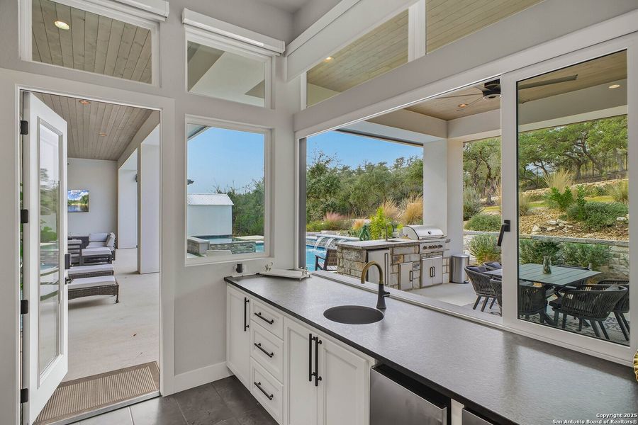 Exterior details and patio area of a home in , San Antonio (Image 56).