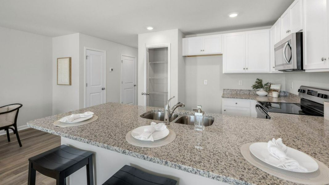 Representative furnished interior of a home built from the PEARSON TOWNHOME by D.R. Horton in Grayson Park Townhomes, Leland (Image 9).