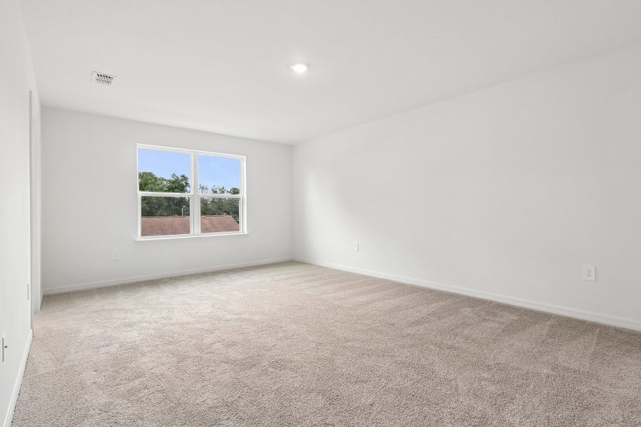 Representative unfurnished interior of a home built from the Florence by Hartizen Homes in Estes Reserve, Eustis (Image 102). Representative unfurnished interior of a home built from the Florence by Hartizen Homes in Estes Reserve, Eustis (Image 102).