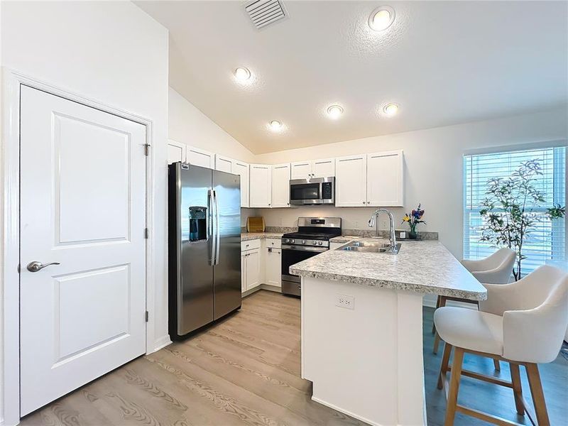 Furnished interior view inside a new home in , The Villages (Image 15).