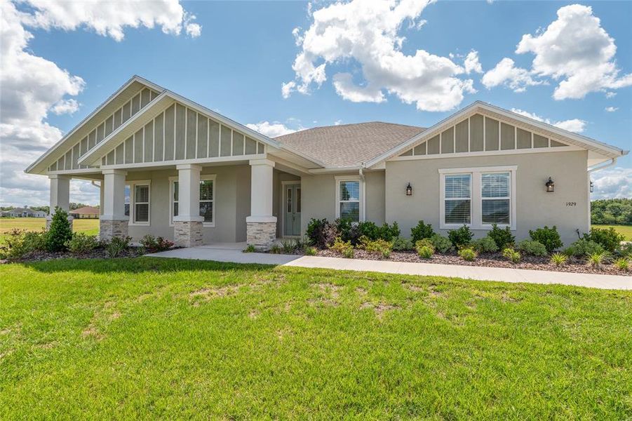 Front exterior of a new home in , Ocala, FL, highlighting curb appeal (Image 26). Front exterior of a new home in , Ocala, FL, highlighting curb appeal (Image 26).