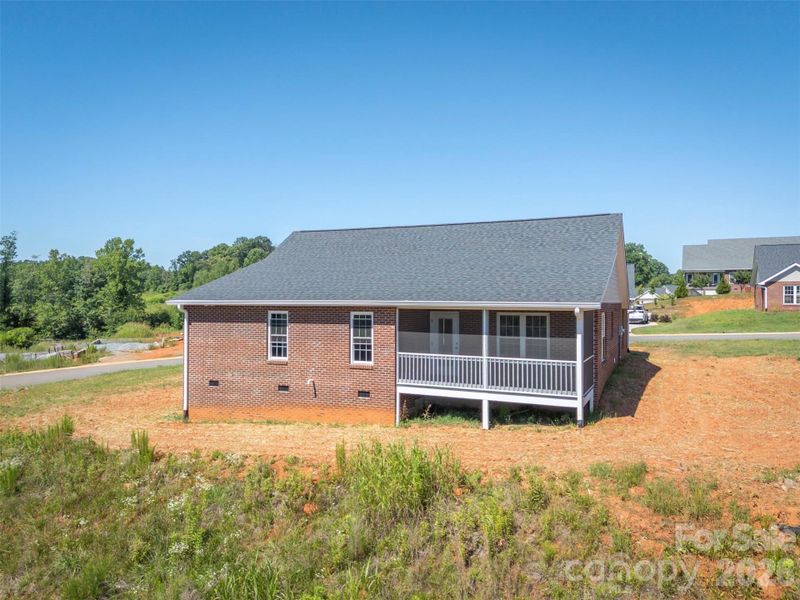 Exterior details and patio area of a home in , Spindale (Image 4).