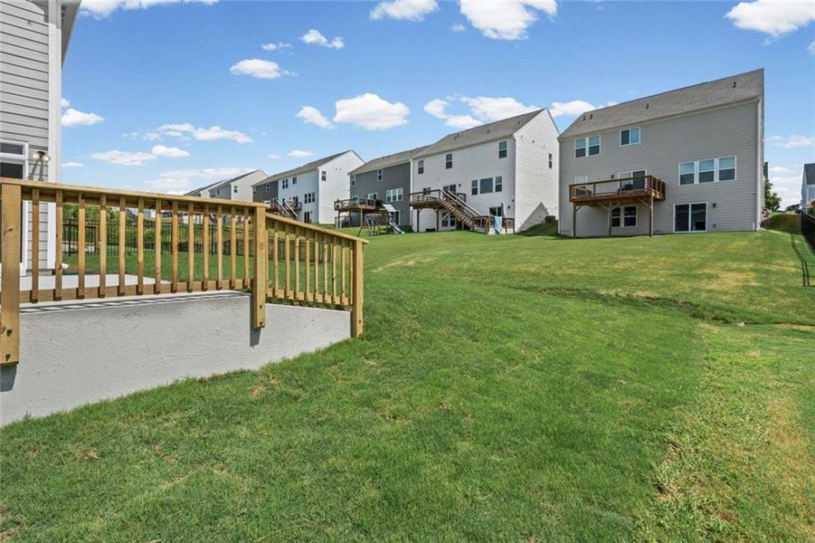 Exterior details and patio area of a home in Twin Lakes, Hoschton (Image 4).