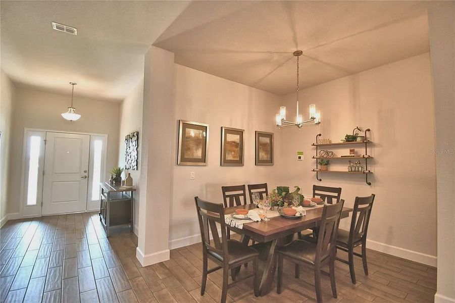 Furnished interior view inside a new home in Magnolia Park, Haines City (Image 9).